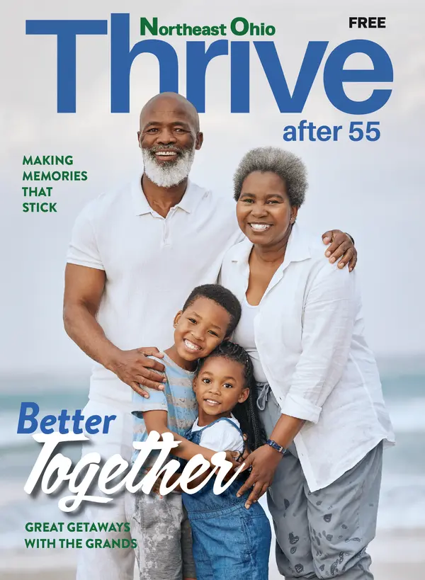 thrive magazine cover of grandparents with their grandchildren on the beach